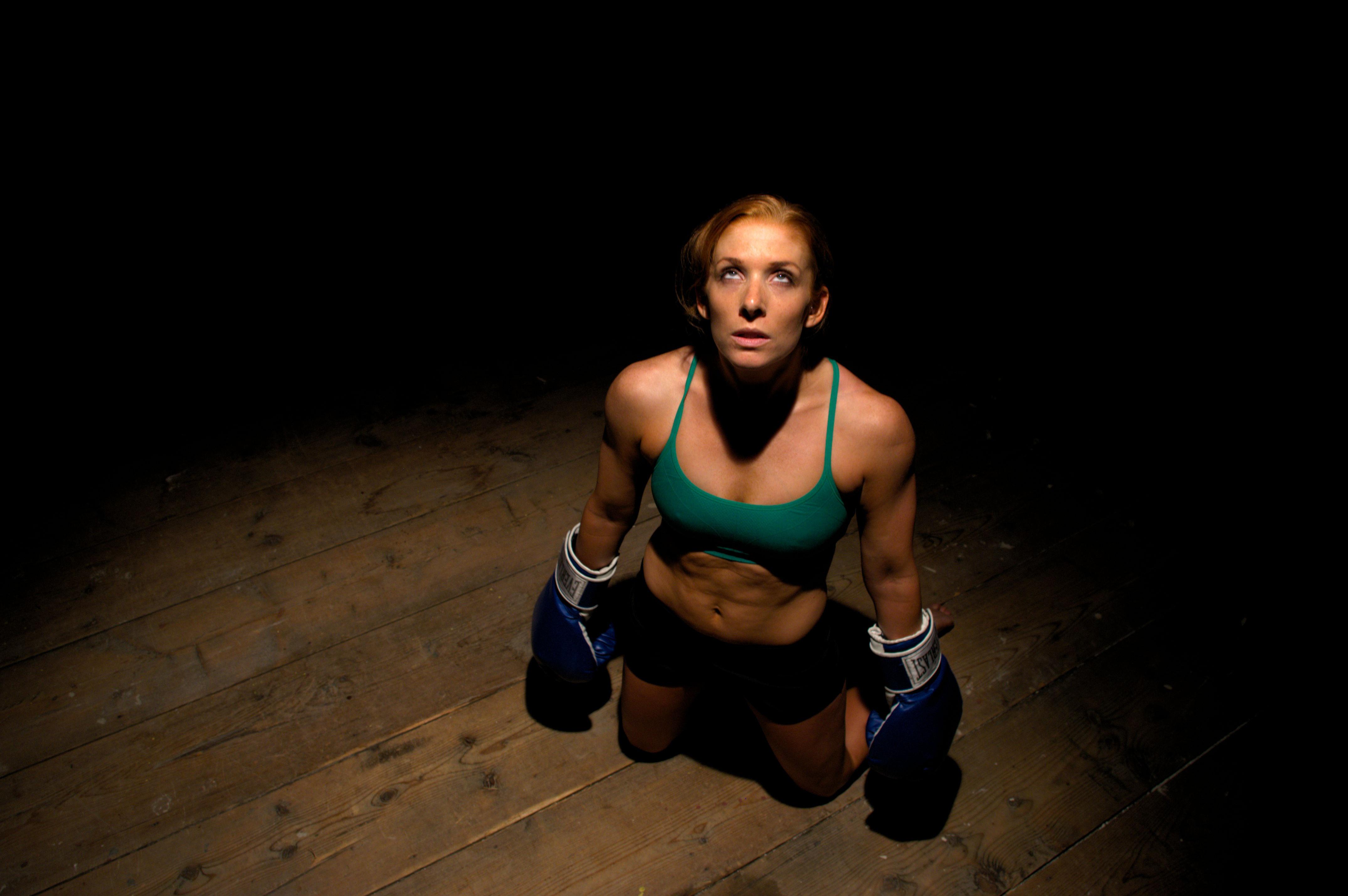 A lone individual sexy climbing a steep hill, symbolizing self-reliance and perseverance